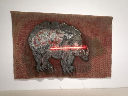 drawing of rhinoceros on canvas with neon light