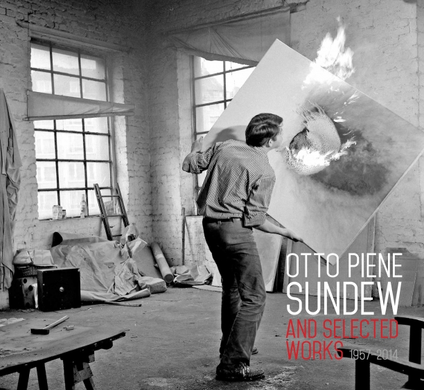 book cover illustrated with a black and white photograph of Otto Piene in his studio holding a canvas that is on fire