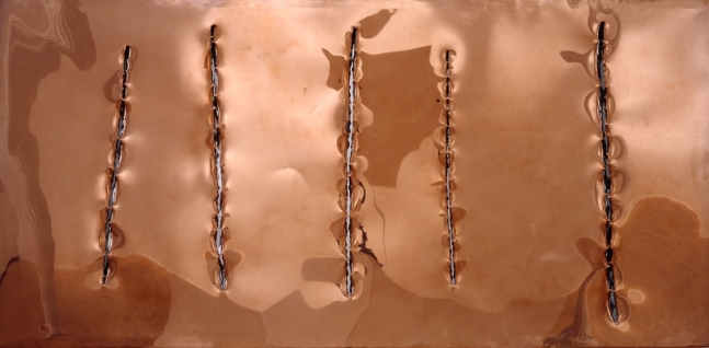 copper sheet with five vertical slashes