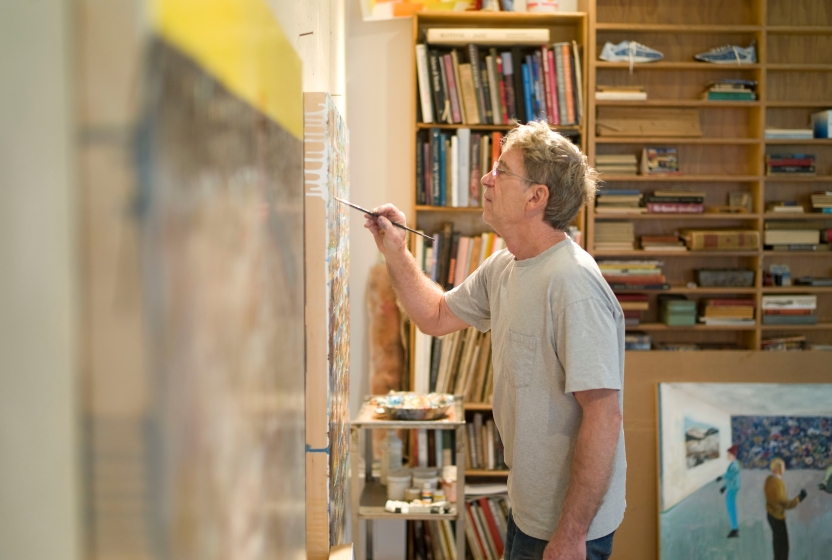 William Wegman works on a painting in his studio